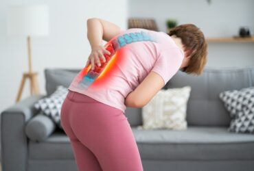 Lumbar,Intervertebral,Spine,Hernia,,Woman,With,Back,Pain,At,Home,